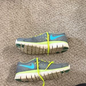 Nike Gray and Blue Sneakers with Neon Accents